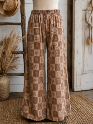 Cozy Cowpony Pants with brown western check print, elastic waistband, front and back pockets, and relaxed fit