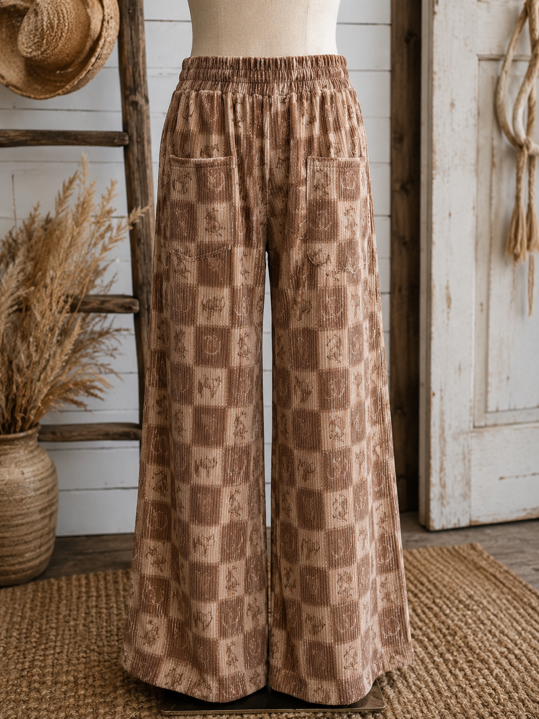 Cozy Cowpony Pants with brown western check print, elastic waistband, front and back pockets, and relaxed fit