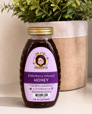 16oz elderberry infused honey made with raw North Carolina wildflower honey and elderberries